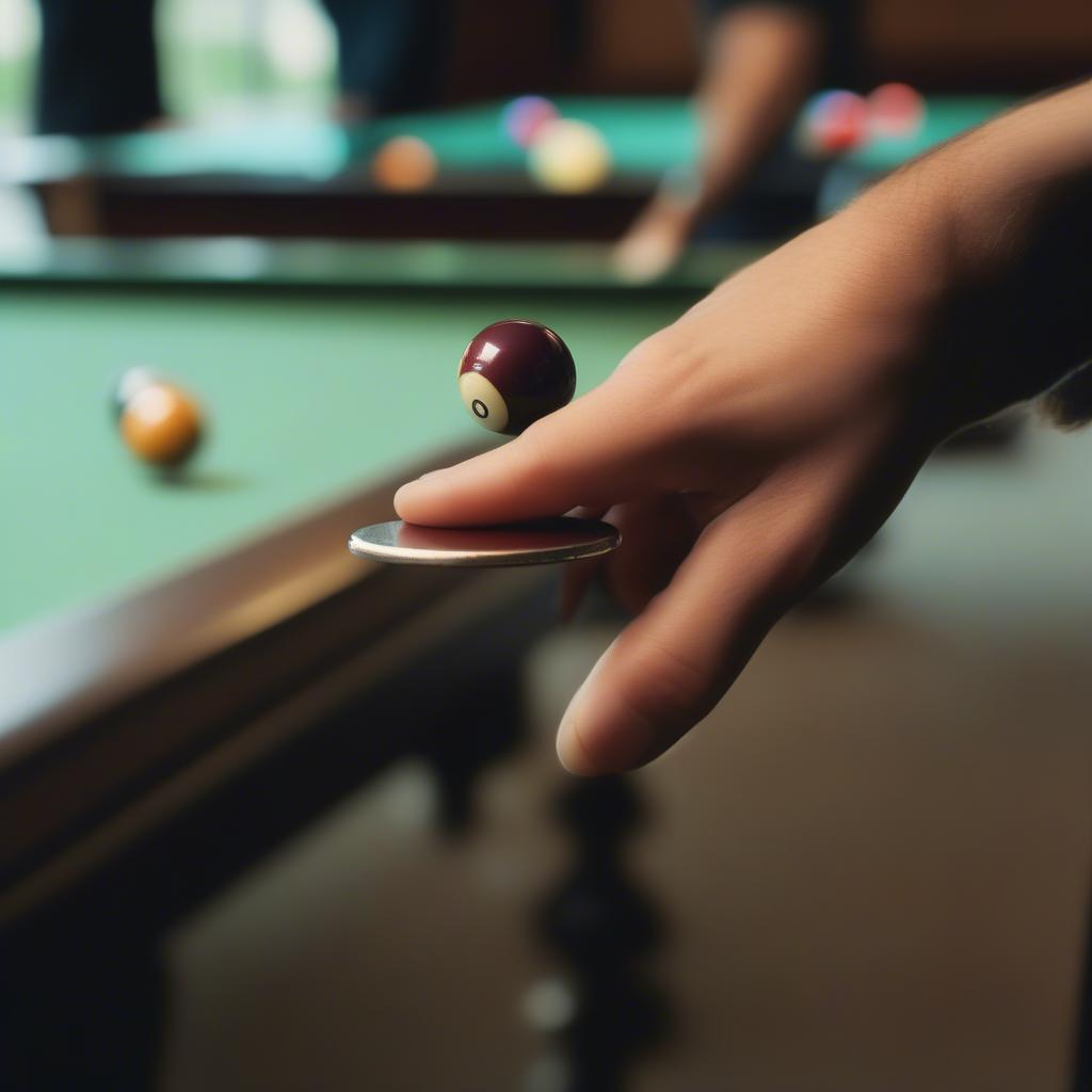 Coin toss to decide the first turn in billiards